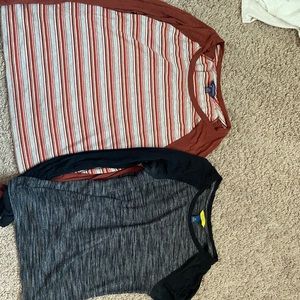 Two long sleeve shirts.